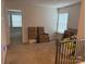 Versatile carpeted room with natural light, perfect for storage or conversion at 9340 Grand Valley Dr, Charlotte, NC 28213