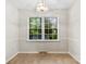 Bright breakfast nook with large windows and tile floor overlooking the backyard at 9640 Heartwood Ln, Mint Hill, NC 28227