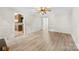Spacious living room with hardwood floors and a ceiling fan; perfect for relaxing at 9640 Heartwood Ln, Mint Hill, NC 28227