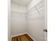 Functional walk-in closet featuring hardwood floors and wire shelving at 975 Copperstone Ln, Fort Mill, SC 29708