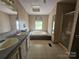 This bathroom features a bathtub, shower, and dual sink vanity at 1001 Bexley Ln, Lincolnton, NC 28092