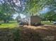 Back view of the home with a deck and partial yard view at 1001 Bexley Ln, Lincolnton, NC 28092