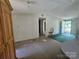Living room with carpet, light fixtures, and natural light at 1001 Bexley Ln, Lincolnton, NC 28092