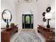 Bright entryway boasting tiled floors, high ceilings, stylish decor, and a front door with decorative glass at 1245 Bellemeade Ln, Charlotte, NC 28270