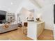 Inviting living space with open floor plan, hardwood flooring, wet bar and lots of natural light and high vaulted ceilings at 1245 Bellemeade Ln, Charlotte, NC 28270