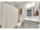 Charming bathroom with a shower-tub combo, single sink vanity, and neutral decor at 1301 Cool Mist Ct, Indian Land, SC 29707