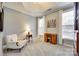 Cozy bedroom featuring a reading nook and ample natural light from large windows at 1301 Cool Mist Ct, Indian Land, SC 29707