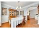 Charming dining room featuring wood floors, a china cabinet and lovely decor at 1301 Cool Mist Ct, Indian Land, SC 29707