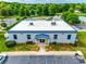 Exterior of the community clubhouse with manicured landscaping and ample parking at 1301 Cool Mist Ct, Indian Land, SC 29707