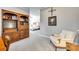 Inviting hallway with built-in bookshelf leading to the main bedroom at 1301 Cool Mist Ct, Indian Land, SC 29707