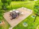 Aerial view of a playground with slides, swings, and picnic tables in a grassy area at 1301 Cool Mist Ct, Indian Land, SC 29707
