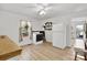 Traditional kitchen with white appliances, laminate floors, and a window with natural light at 1339 Hill St, Albemarle, NC 28001