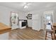 Functional kitchen layout, featuring laminate flooring and access to backyard at 1339 Hill St, Albemarle, NC 28001