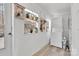 Laundry room featuring white appliances, ample lighting, and shelving at 1339 Hill St, Albemarle, NC 28001