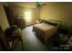 Bedroom featuring carpeted floors, neutral wall color, natural light, and ceiling fan at 1502 Shelby Hwy, Cherryville, NC 28021