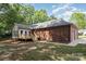 Spacious backyard featuring a wood deck and mature trees, perfect for outdoor living at 1513 White Ridge Dr, Rock Hill, SC 29732