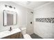 Modern bathroom showcasing stylish vanity, new toilet, and elegant shower with decorative tiling at 1513 White Ridge Dr, Rock Hill, SC 29732