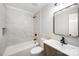 Well-lit bathroom featuring a tub, modern fixtures, and stylish tile work at 1513 White Ridge Dr, Rock Hill, SC 29732