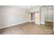 Neutral bedroom with wood floors and sliding closet doors, a peaceful retreat at 1513 White Ridge Dr, Rock Hill, SC 29732