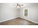 Well lit bedroom with vinyl floors, a ceiling fan and natural lighting, promoting relaxation at 1513 White Ridge Dr, Rock Hill, SC 29732