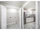 Bright kitchen view showcasing stainless steel appliances and stylish white cabinets at 1513 White Ridge Dr, Rock Hill, SC 29732