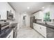 Stylish kitchen with stainless steel appliances, modern cabinetry, granite countertops, and abundant lighting creating an inviting space at 1513 White Ridge Dr, Rock Hill, SC 29732