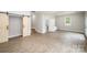 Inviting living room with hardwood floors, staircase, and an attached sink area at 1513 White Ridge Dr, Rock Hill, SC 29732
