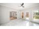 Inviting sunroom featuring a brick wall and access to a deck with abundant natural light at 1513 White Ridge Dr, Rock Hill, SC 29732
