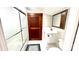 Clean bathroom featuring a shower, a white sink and new fixtures at 16603 Nc Hwy 73 Hwy, Albemarle, NC 28001