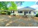 Charming single story home with a covered front porch and an attached carport at 16603 Nc Hwy 73 Hwy, Albemarle, NC 28001