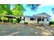 Charming single story home with a covered front porch and an attached carport at 16603 Nc Hwy 73 Hwy, Albemarle, NC 28001