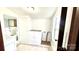 Clean laundry room with storage and bright light at 16603 Nc Hwy 73 Hwy, Albemarle, NC 28001