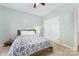 Cozy bedroom featuring neutral walls, carpet and double door closet at 1728 Privette Rd, Matthews, NC 28105