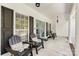 Cozy front porch with Adirondack chairs and decorative pillows at 1728 Privette Rd, Matthews, NC 28105