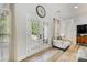 Bright living area with French doors leading to the outside at 1728 Privette Rd, Matthews, NC 28105