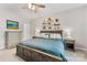 Spacious main bedroom with a large bed, side tables and dressers at 1728 Privette Rd, Matthews, NC 28105