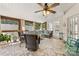 Charming sunroom with brick flooring, ample seating, and natural light at 1728 Privette Rd, Matthews, NC 28105