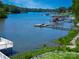Picturesque view of the lake with boat docks from the home at 174 Perrin Dr, Mooresville, NC 28117
