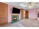 Bedroom featuring a built-in fireplace with a television at 192 Diana Dr, Mount Gilead, NC 27306