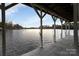 Spacious boathouse with ample docking space and serene lake views on a sunny day at 192 Diana Dr, Mount Gilead, NC 27306