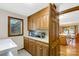 Convenient laundry area offering ample cabinet storage and a window for natural light at 192 Diana Dr, Mount Gilead, NC 27306
