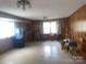 Spacious living room with paneling, large windows and flexible layout at 205 Rudolph Rd, Salisbury, NC 28146