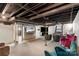 This finished basement boasts bar seating, a TV lounge, and ample space for entertainment at 213 Lakeview Dr, Harrisburg, NC 28075
