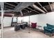 Finished basement featuring a versatile layout with seating areas and potential for various uses at 213 Lakeview Dr, Harrisburg, NC 28075