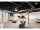 Unfinished basement featuring painted ceilings, concrete floor, and large open space at 213 Lakeview Dr, Harrisburg, NC 28075