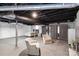 A large finished basement offers bedroom, storage, seating, and versatility for various activities at 213 Lakeview Dr, Harrisburg, NC 28075