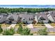 Aerial view of neighborhood featuring well-maintained homes with landscaped yards and tree-lined streets at 213 Warbler Dr, Monroe, NC 28110