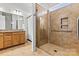 Beautiful bathroom with a modern tiled shower, glass door, and double sink vanity at 213 Warbler Dr, Monroe, NC 28110
