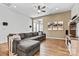 A large sectional couch compliments the adjacent eat-in nook and makes for a great living room space at 213 Warbler Dr, Monroe, NC 28110