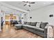 Comfortable living room with hardwood flooring and a view of the kitchen area at 213 Warbler Dr, Monroe, NC 28110
